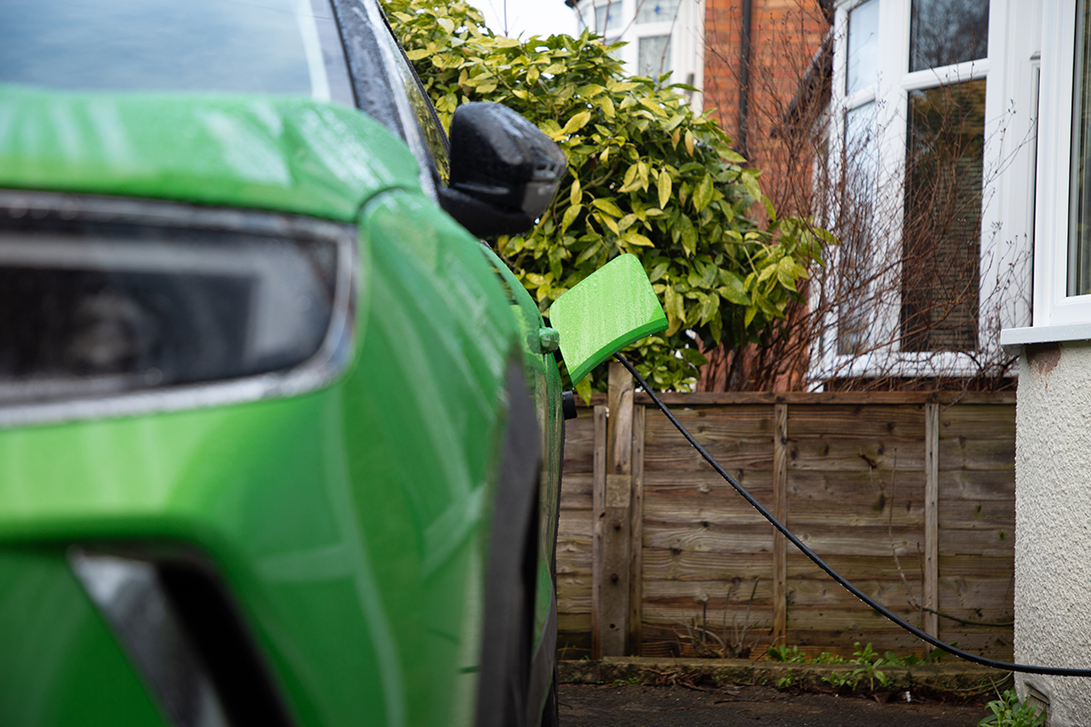 Green car using a Home EV Charger